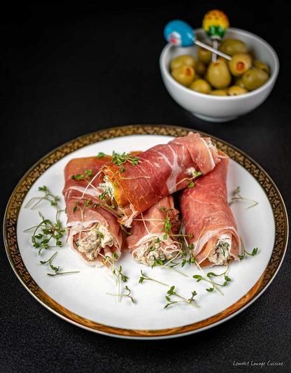 Rollitos de jamon serrano reserva y queso gouda